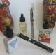 Vape OM Evod nas cores prata e preto, com essências Gallery, importadas dos EUA.